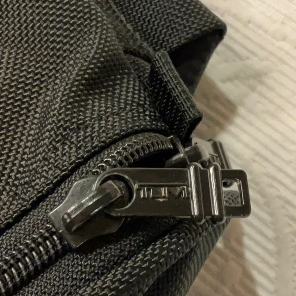 Tumi Alpha or Alpha 3 Men's Backpack, Multi Pockets, Adj Straps. Luggage tag.